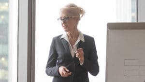 Businesswoman in front of whiteboard